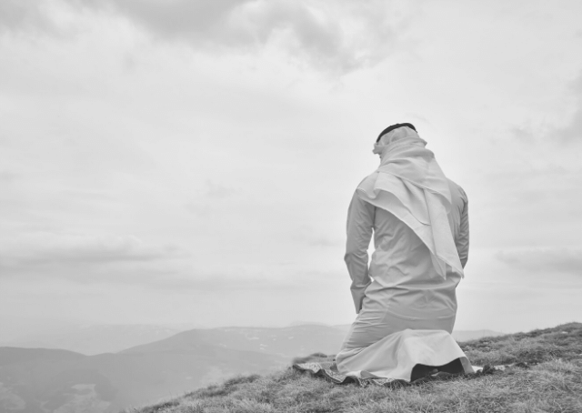 Arab Muslim praying