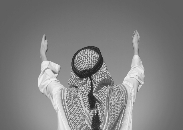 Arab with raised hands