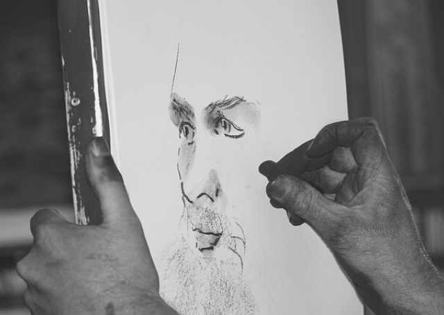 Non-Muslim painter drawing Muhammad
