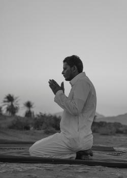 Praying Muslim man